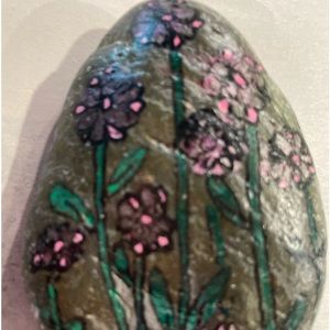 Small hand painted rock. “Little Pink Flowers” about 2 inches wide